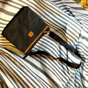 Brics Black w/brown trim handbag.